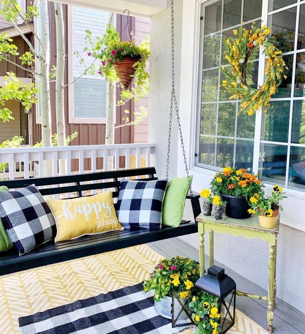 Layer Black and White Pillows on a Swing Bench