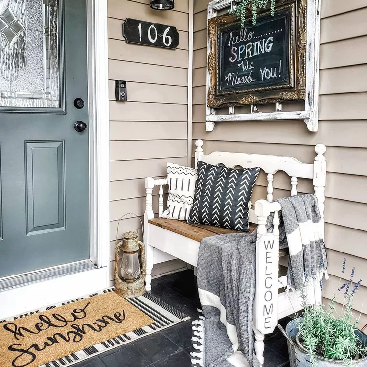 Chalkboard Sign Above Bench Welcomes Spring Visitors
