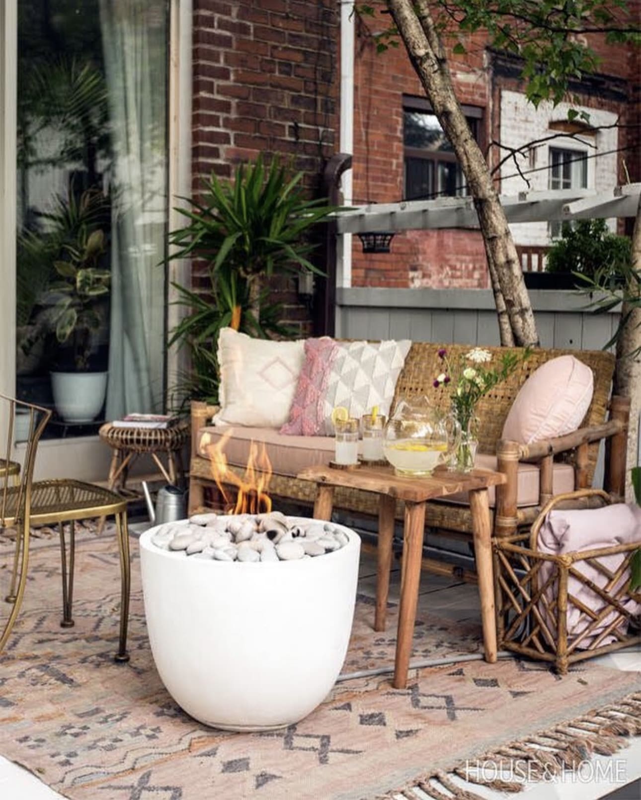 Anchor Your Seating with a Round White Fire Pit