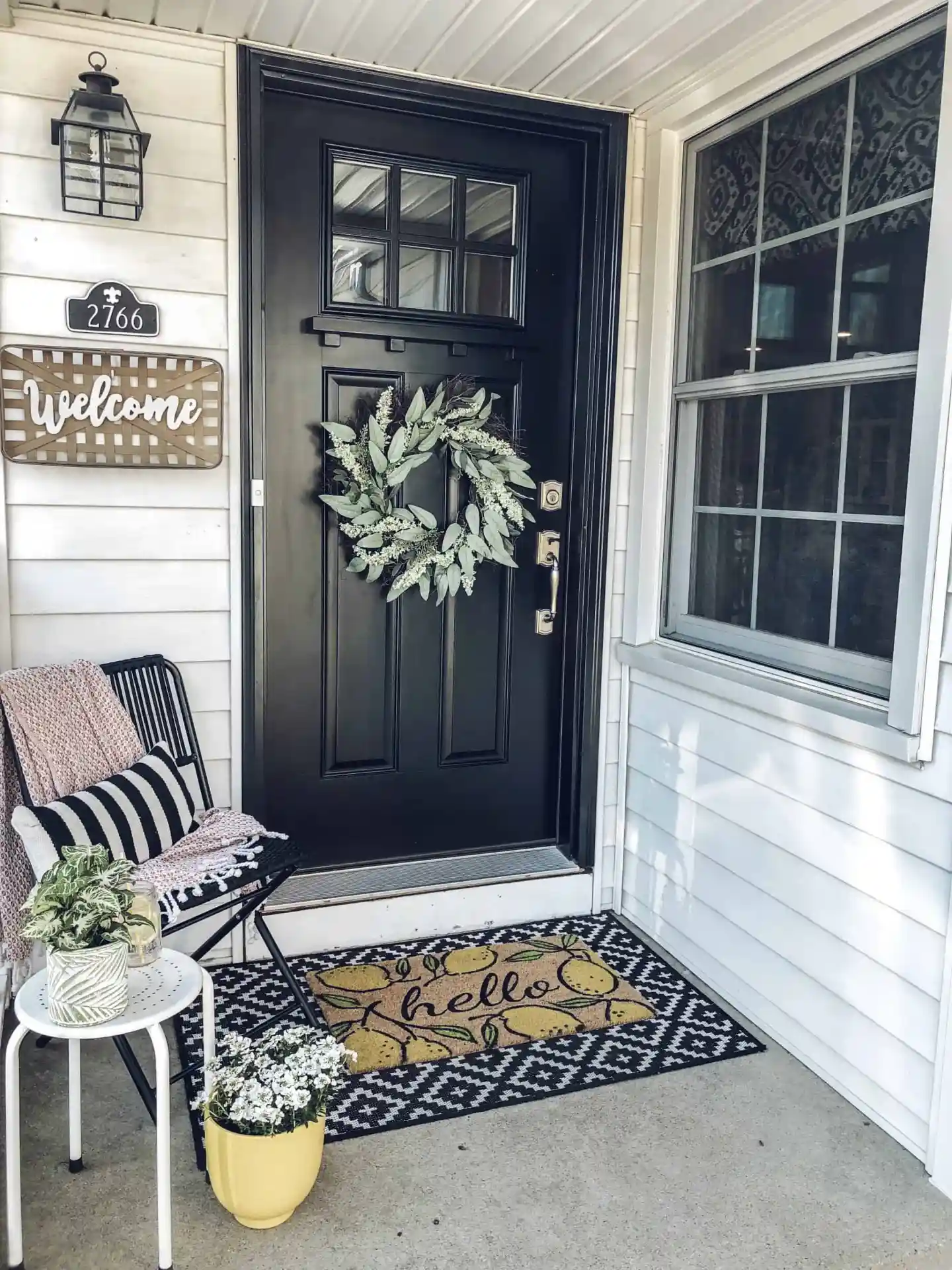 Layer a Lemon Doormat Over a Geometric Rug