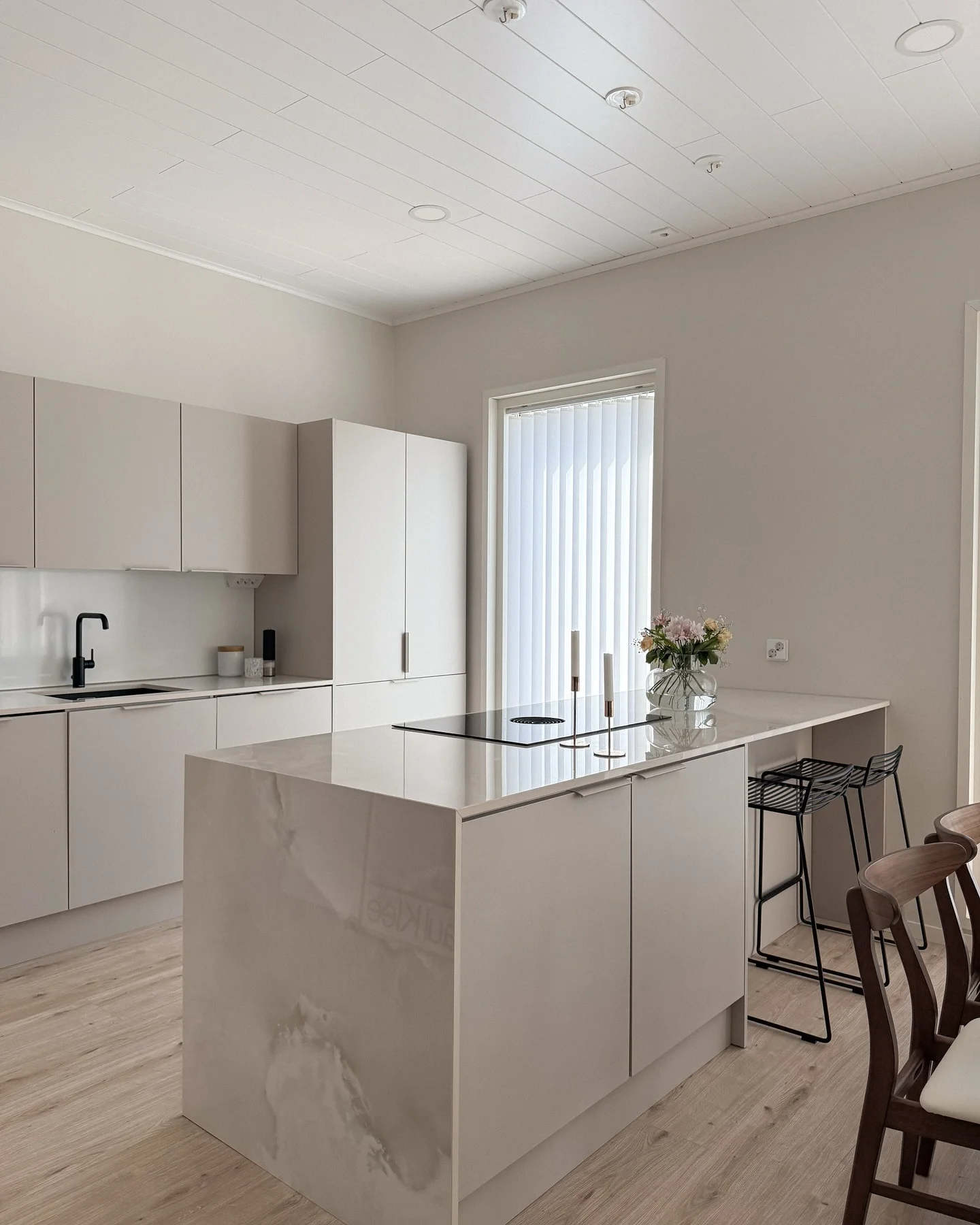 Marble-Look Island Creates a Chic Focal Point