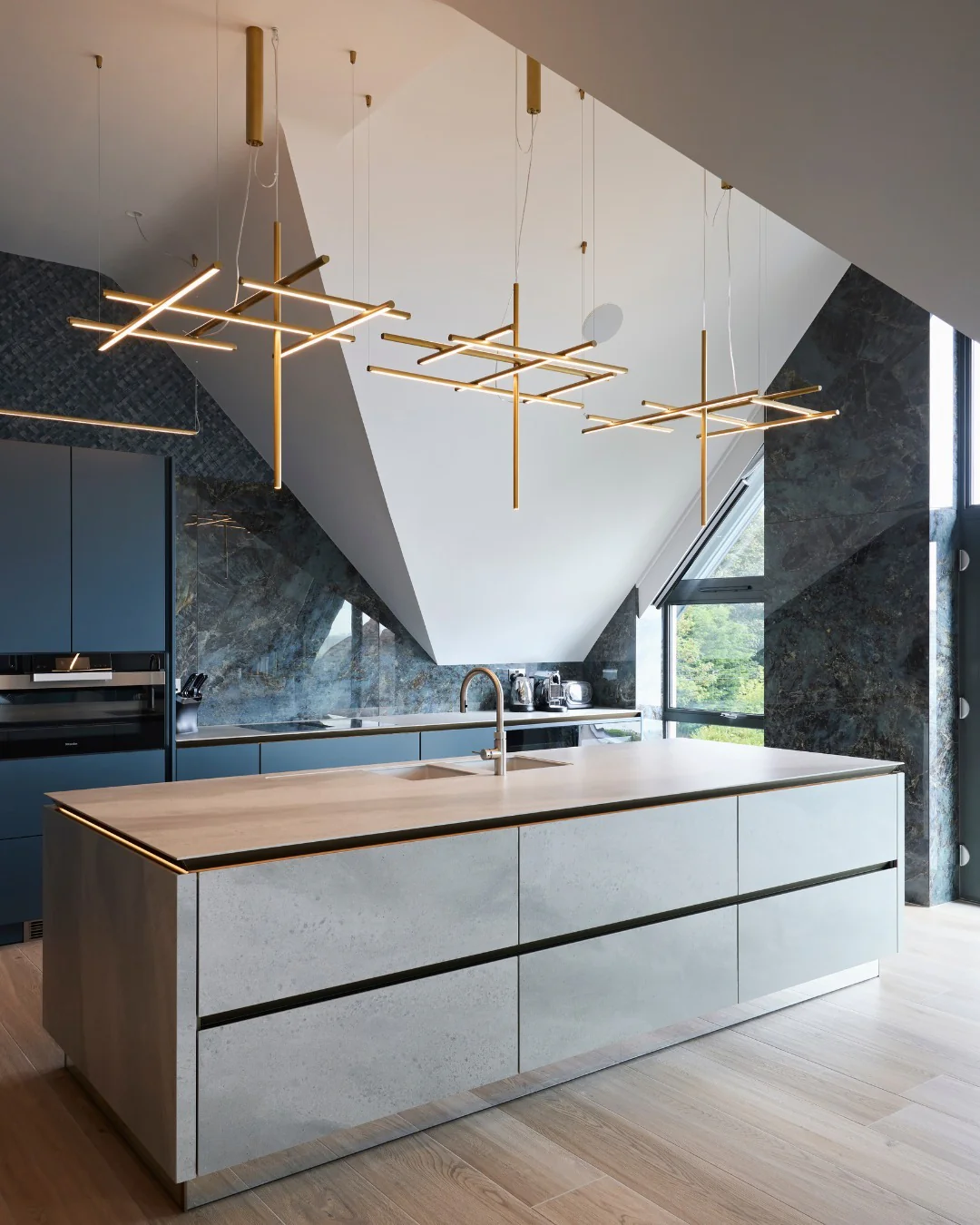 Geometric Brass Pendants Illuminate the Kitchen
