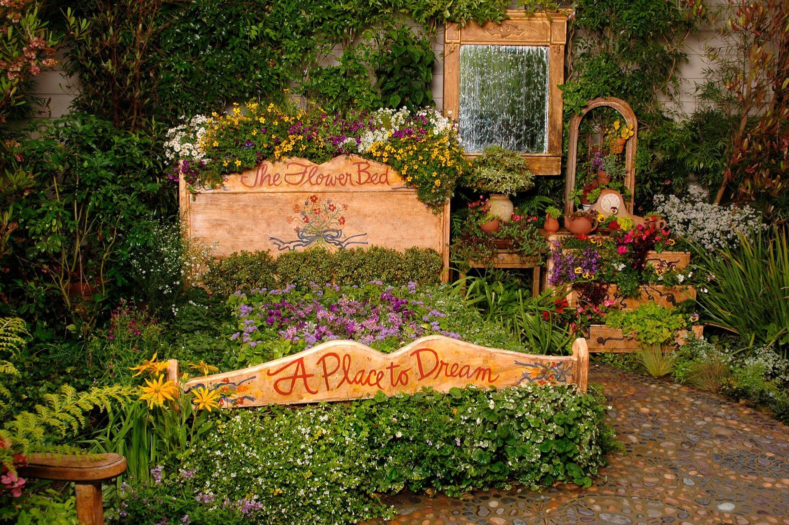 Wooden Headboards Repurposed as Flower Bed Edging
