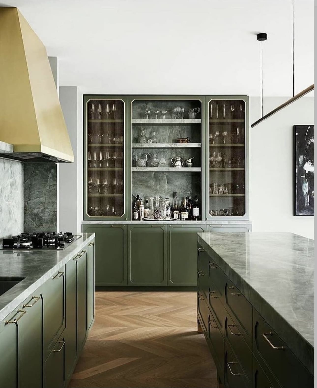 Glass-fronted cabinets display barware and glassware