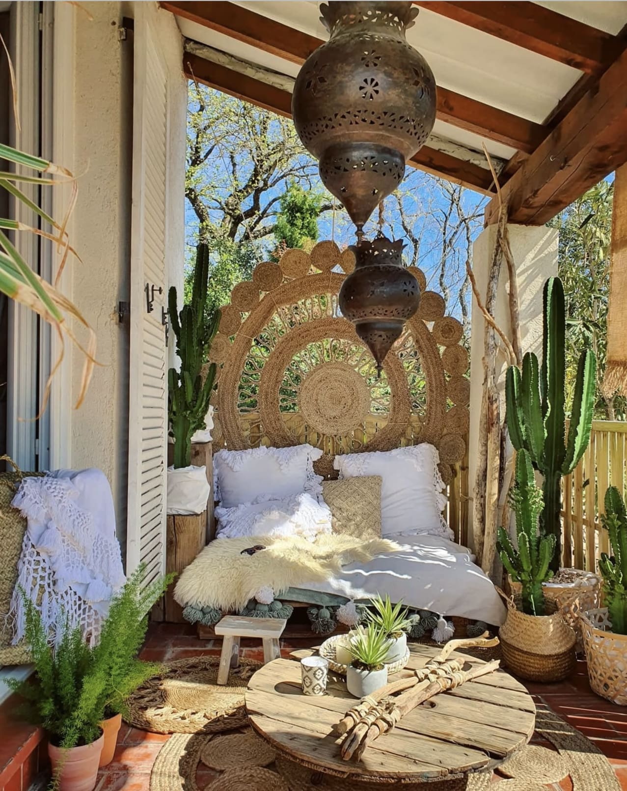 Jute Sunburst Wall Hanging Creates a Boho Headboard