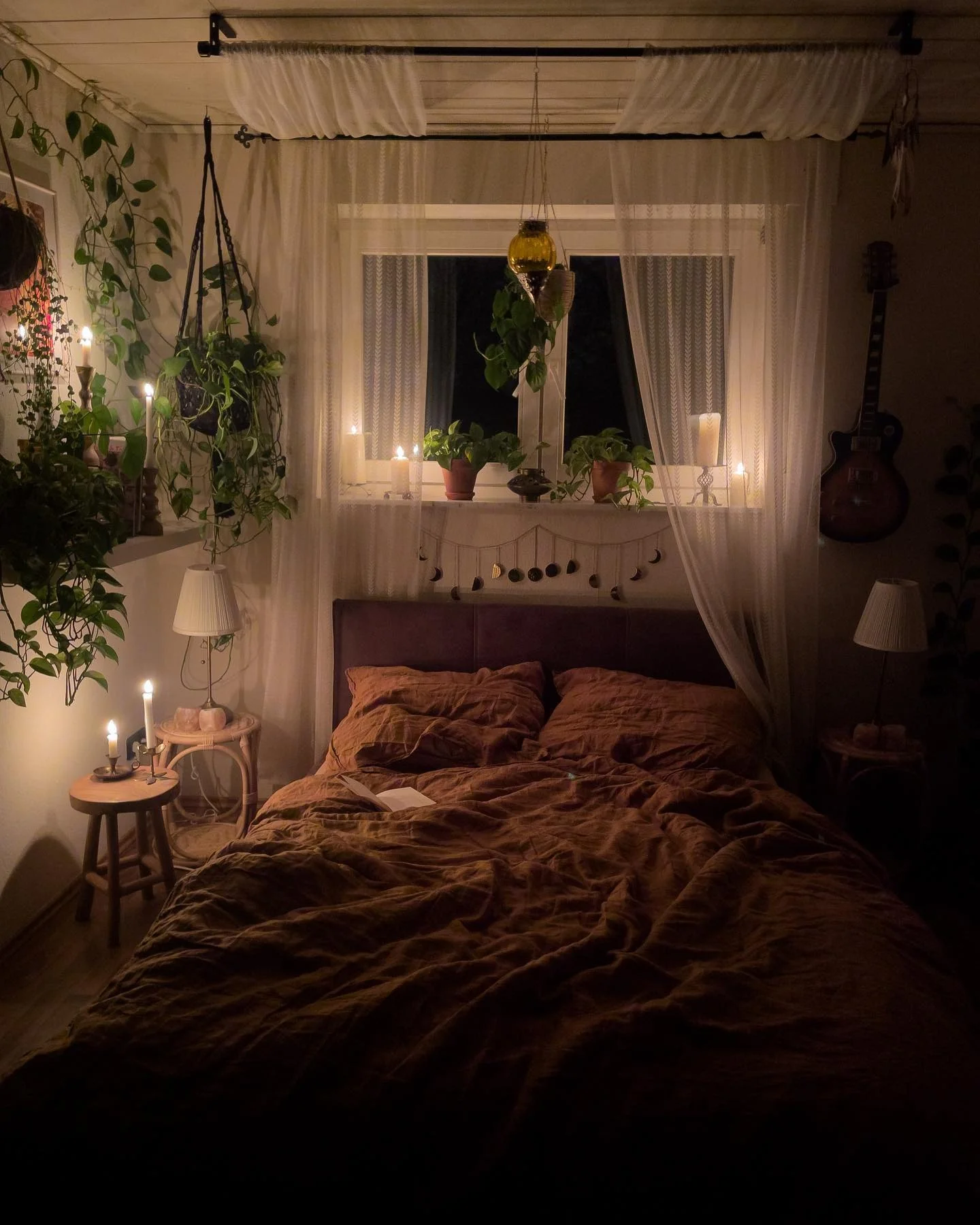 Moon Phase Garland Adds Celestial Charm Above the Bed