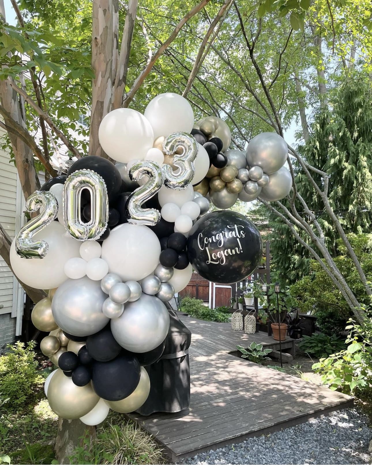 Oversized Balloon Archway Frames the Graduation Year