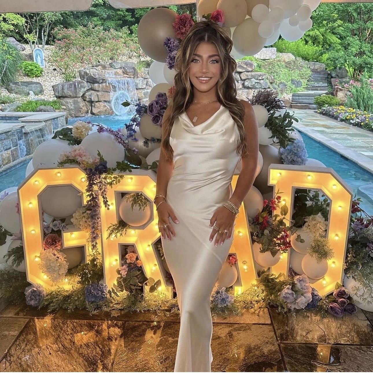 Illuminate Your Backdrop with Marquee Letters and Florals