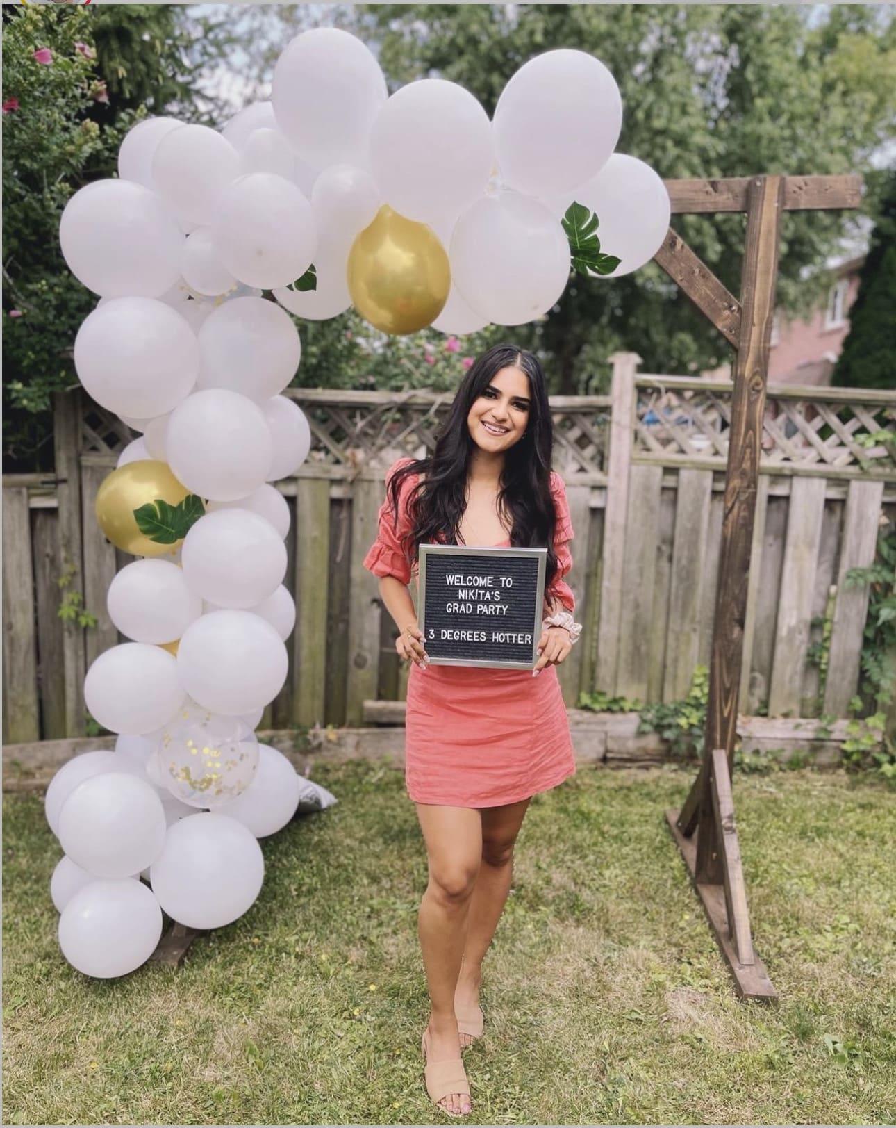 Welcome Guests with a Balloon Arch and Custom Sign