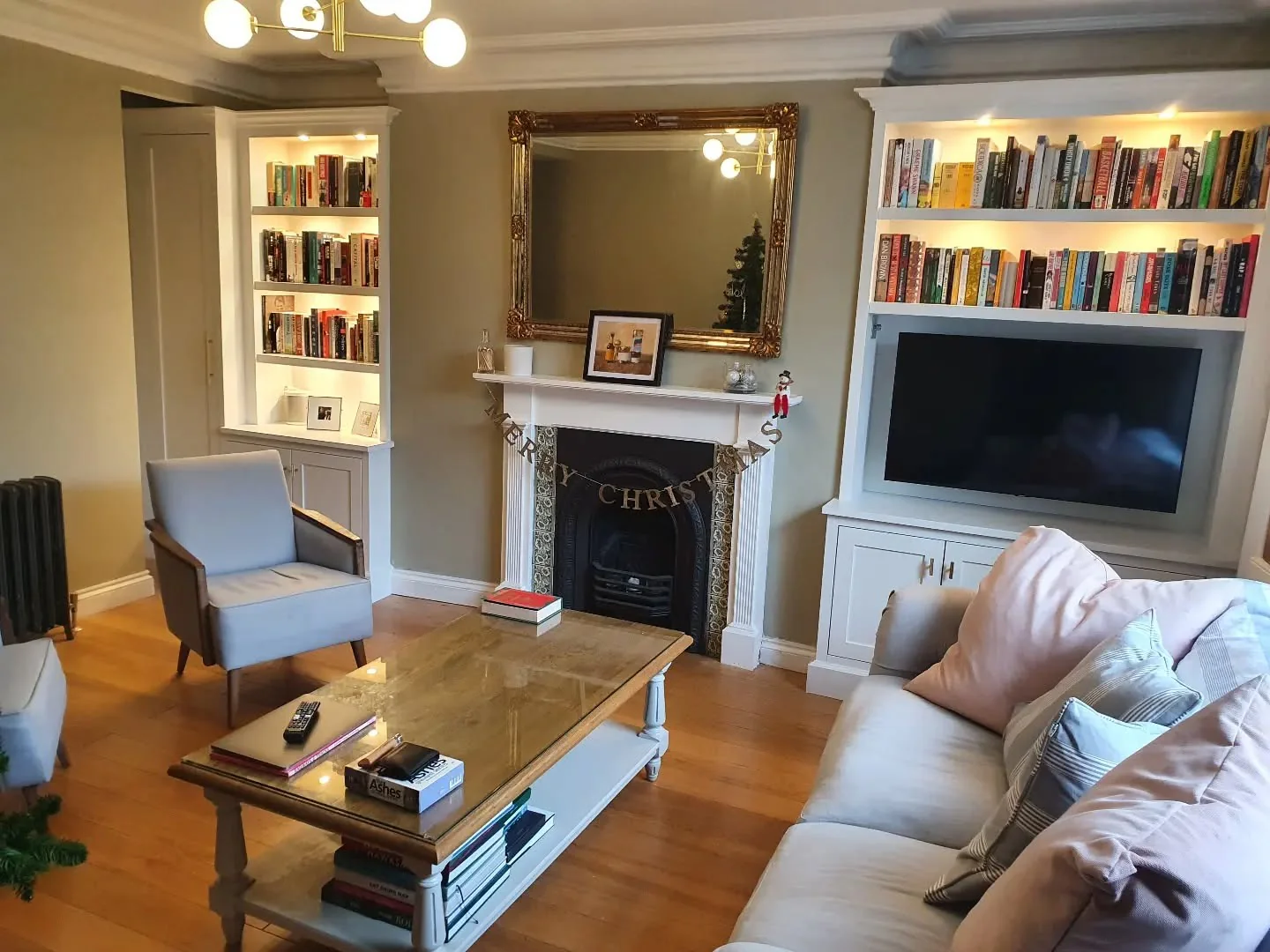 Achieve a Unified Look with Built-in Shelving Hiding a TV
