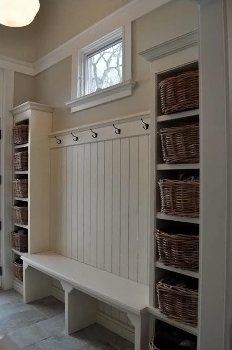 Tall Narrow Shelving Units Hold Woven Baskets for Entryway Storage
