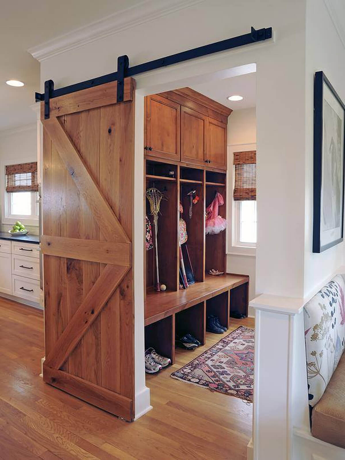 Wooden cubbies hold sports gear and dance attire