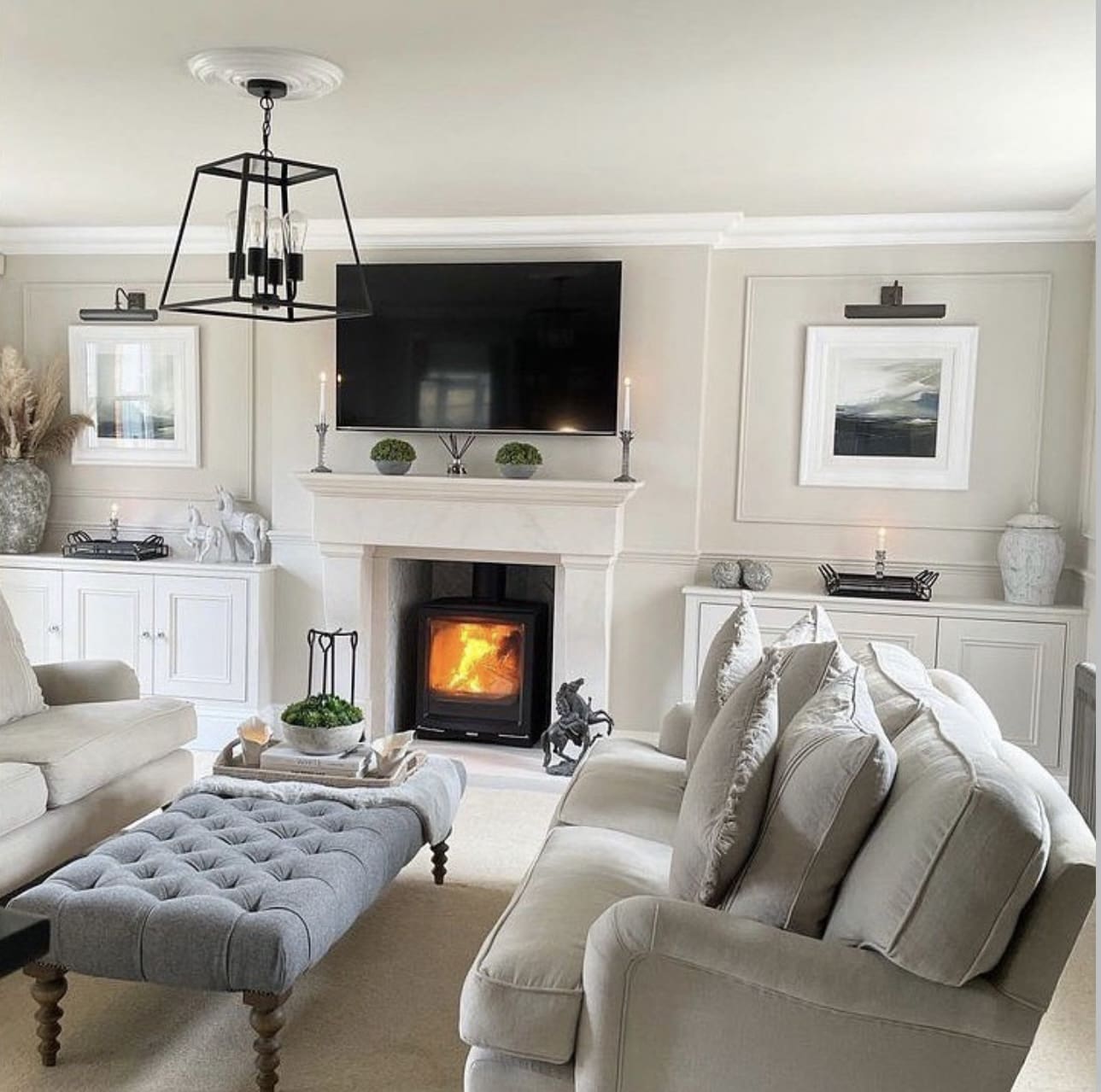 Achieve Symmetry with Framed Artwork Above Cabinets