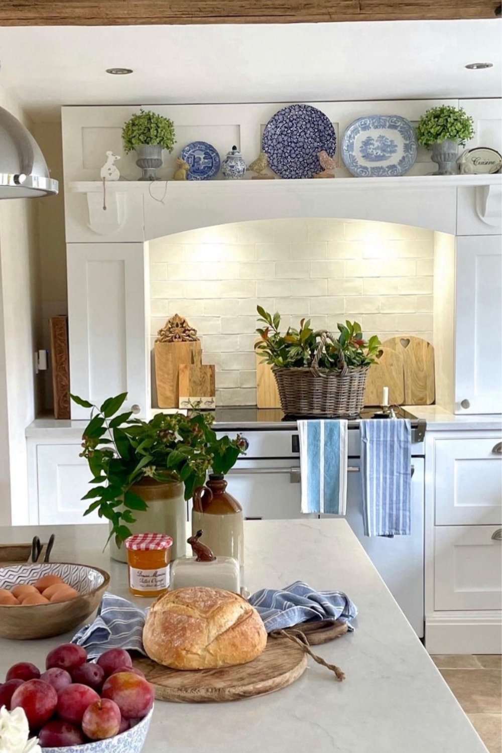 Blue and White Plates as Rustic Range Hood Accents