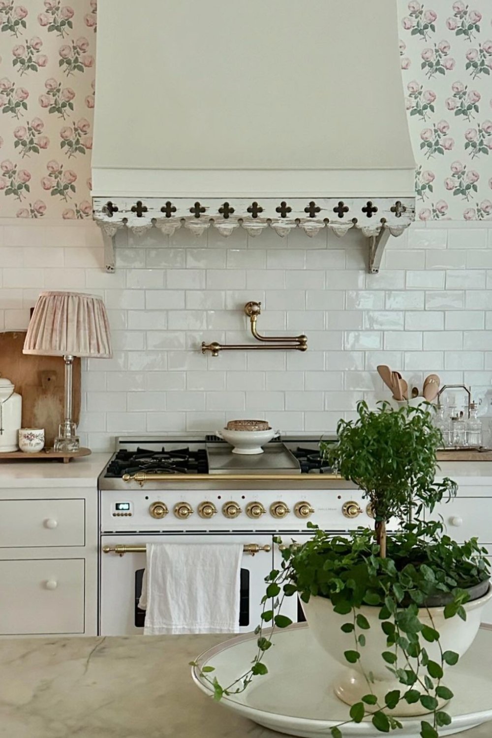 Ornate Wood Trim Adds Gothic Detail Above the Range