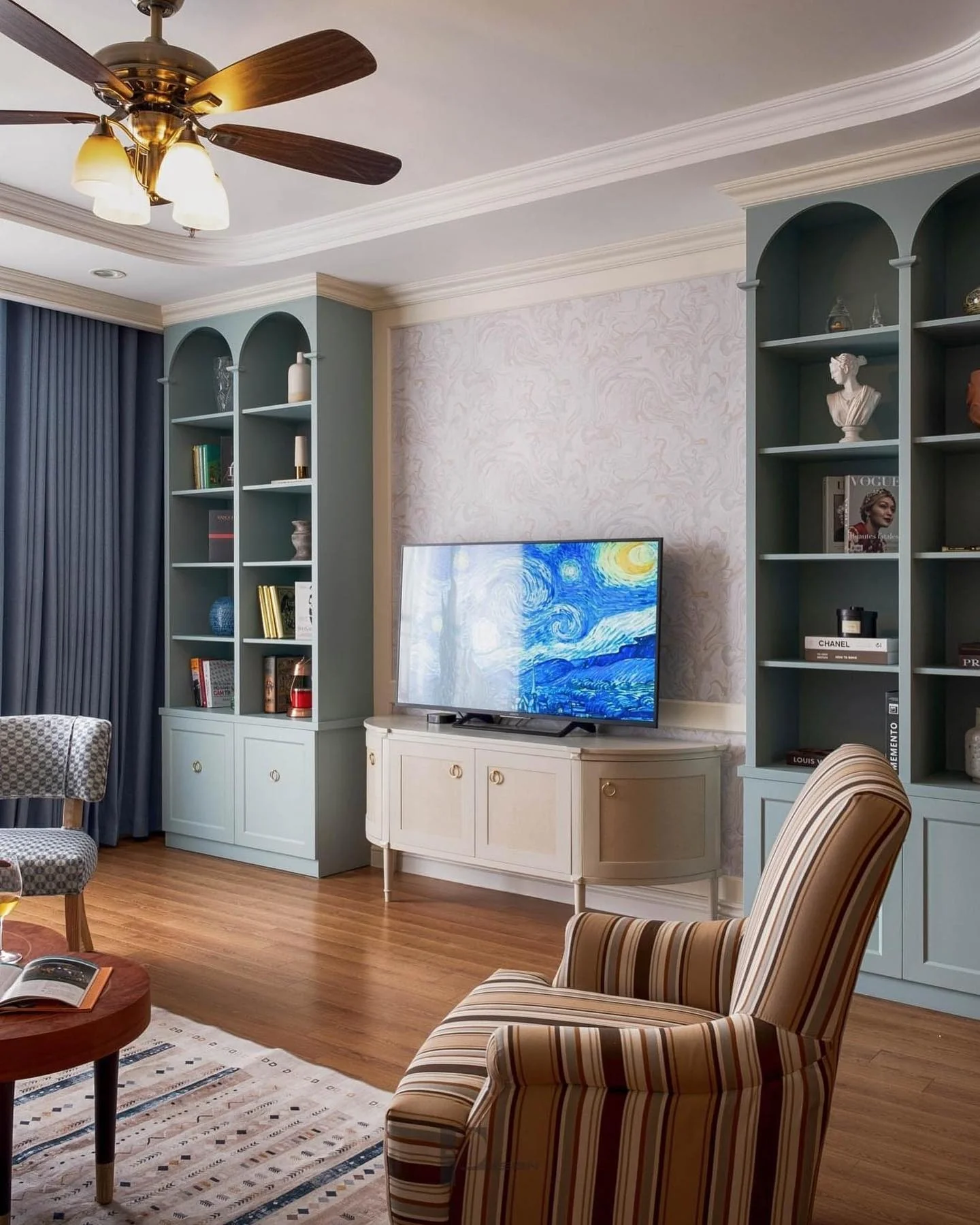 Frame Your Television With Arch-Top Built-In Bookcases