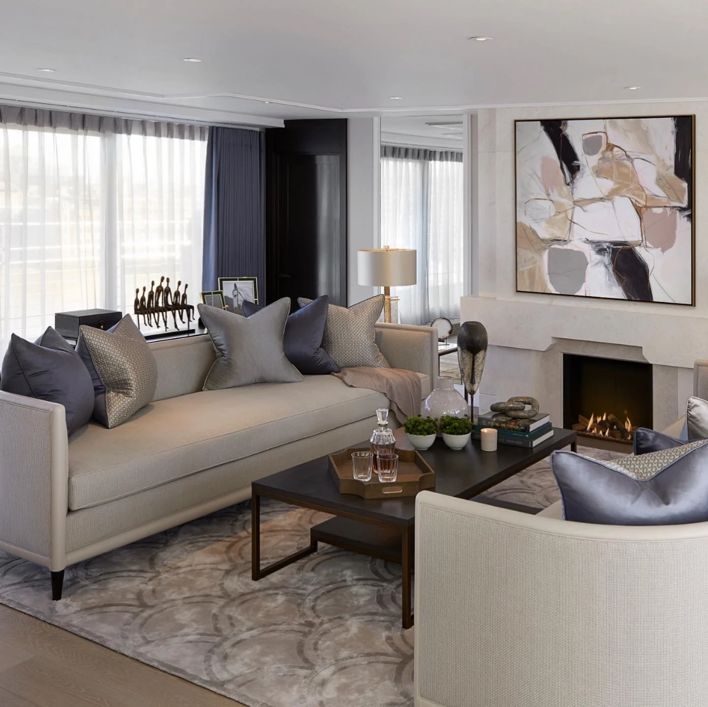 Abstract Artwork Above Fireplace Creates a Dramatic Focal Point
