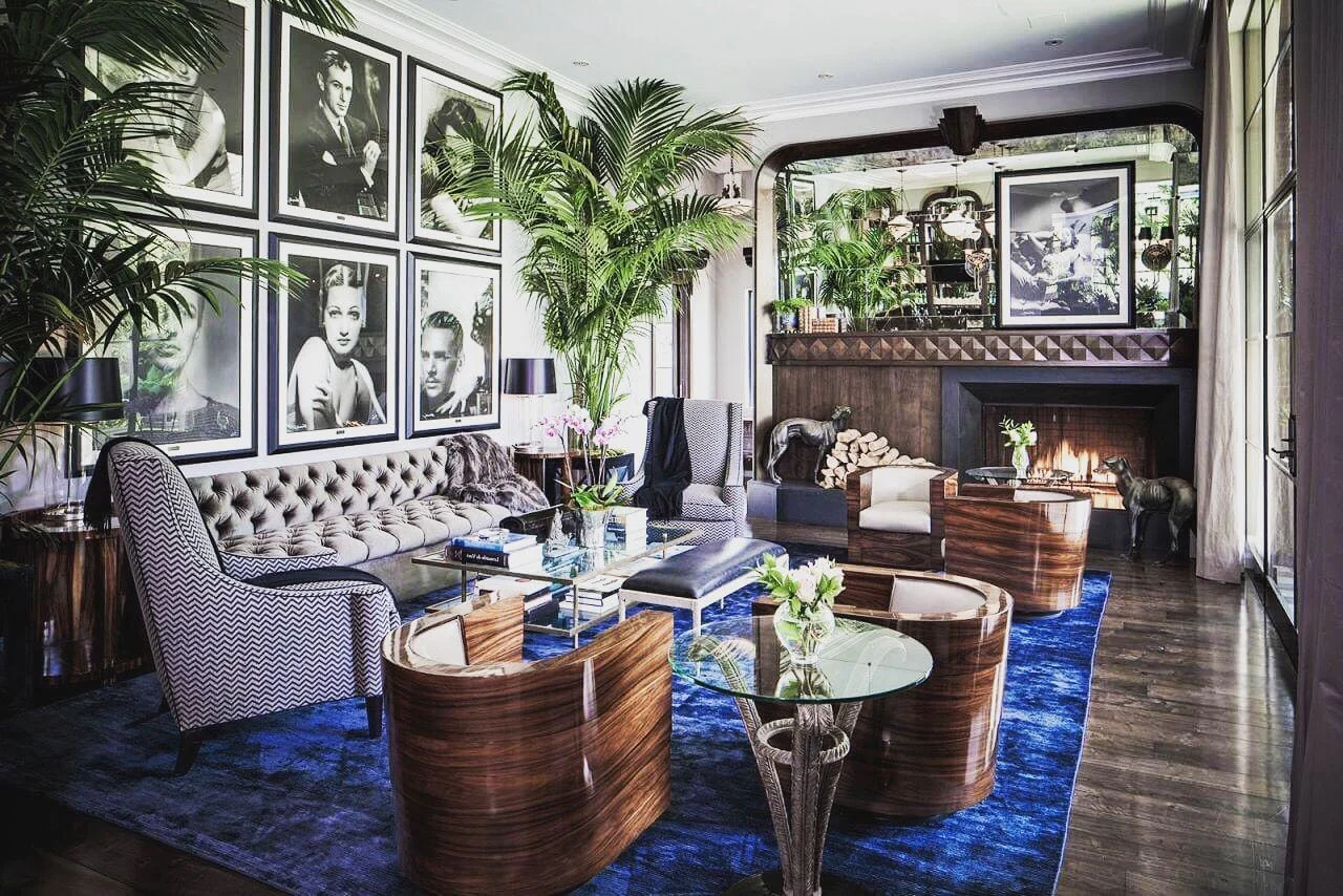 Gallery Wall of Vintage Portraits Adds Dramatic Focal Point