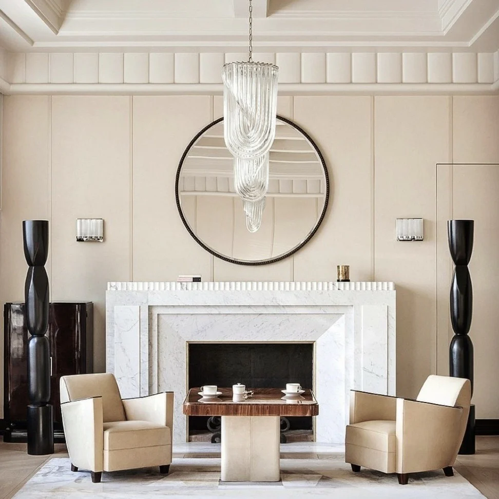 Frame Your Fireplace With Sculptural Black Vases