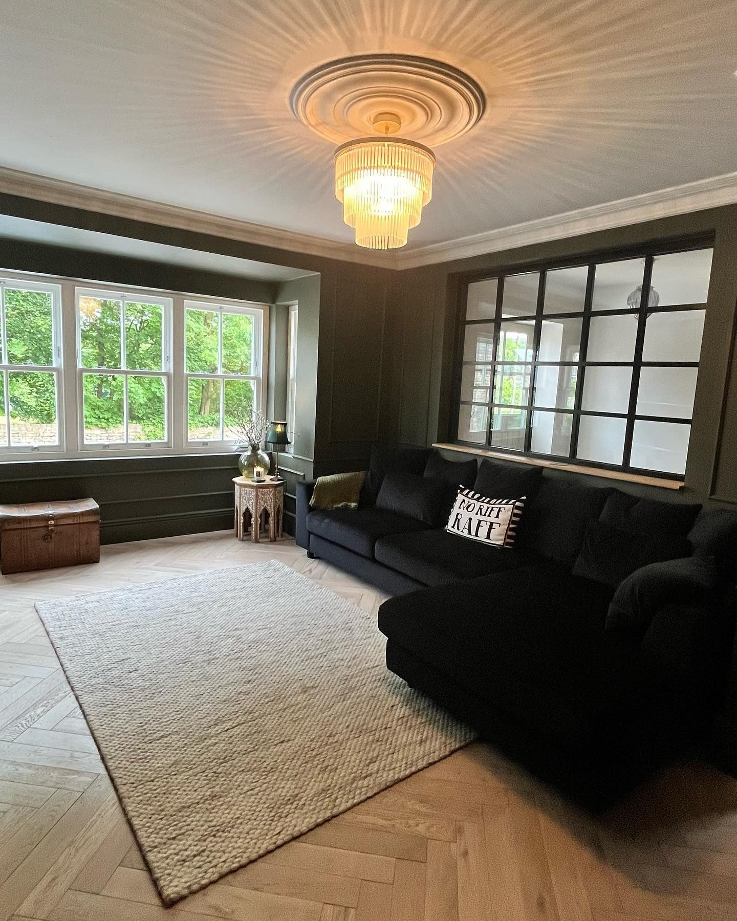 Moody Backdrop: Dark Walls Frame Your Black Sofa
