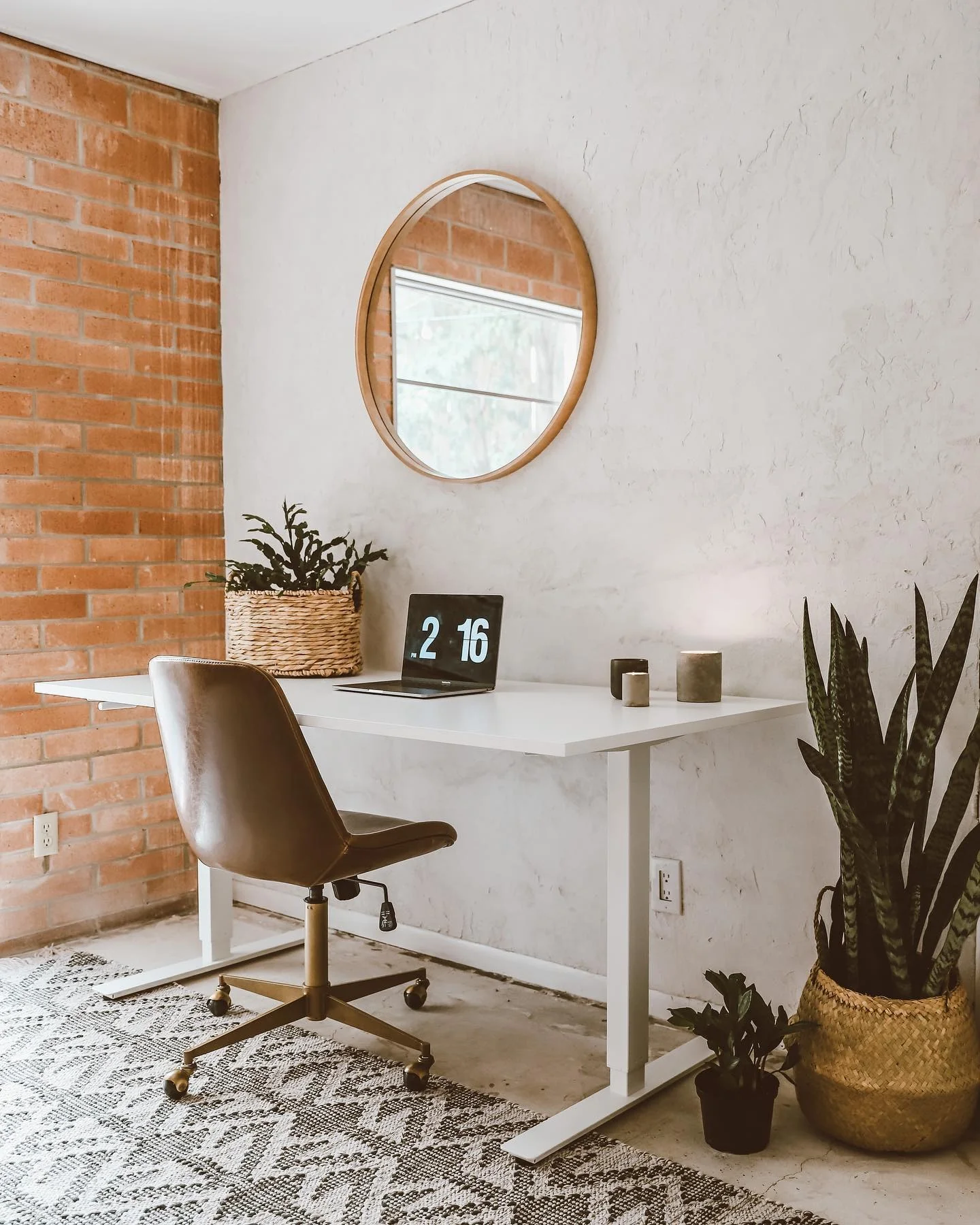 Round Mirror Softens a Minimalist Desk