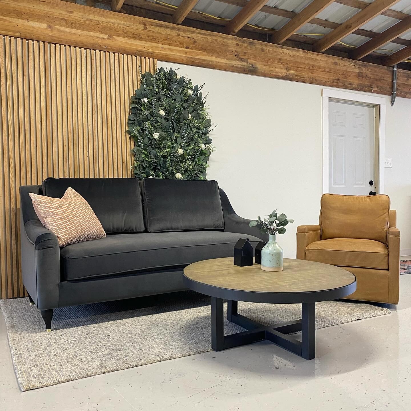Slatted Wood Wall Adds Warm Contrast to Charcoal