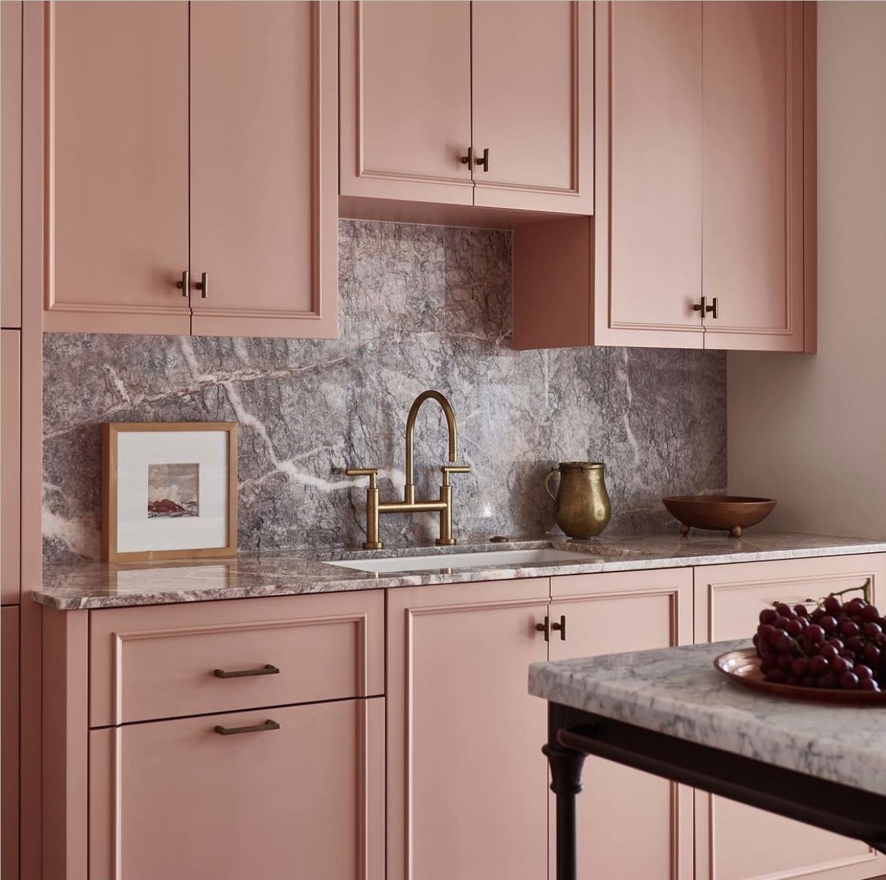 Framed Artwork Adds a Personal Touch Above the Countertop