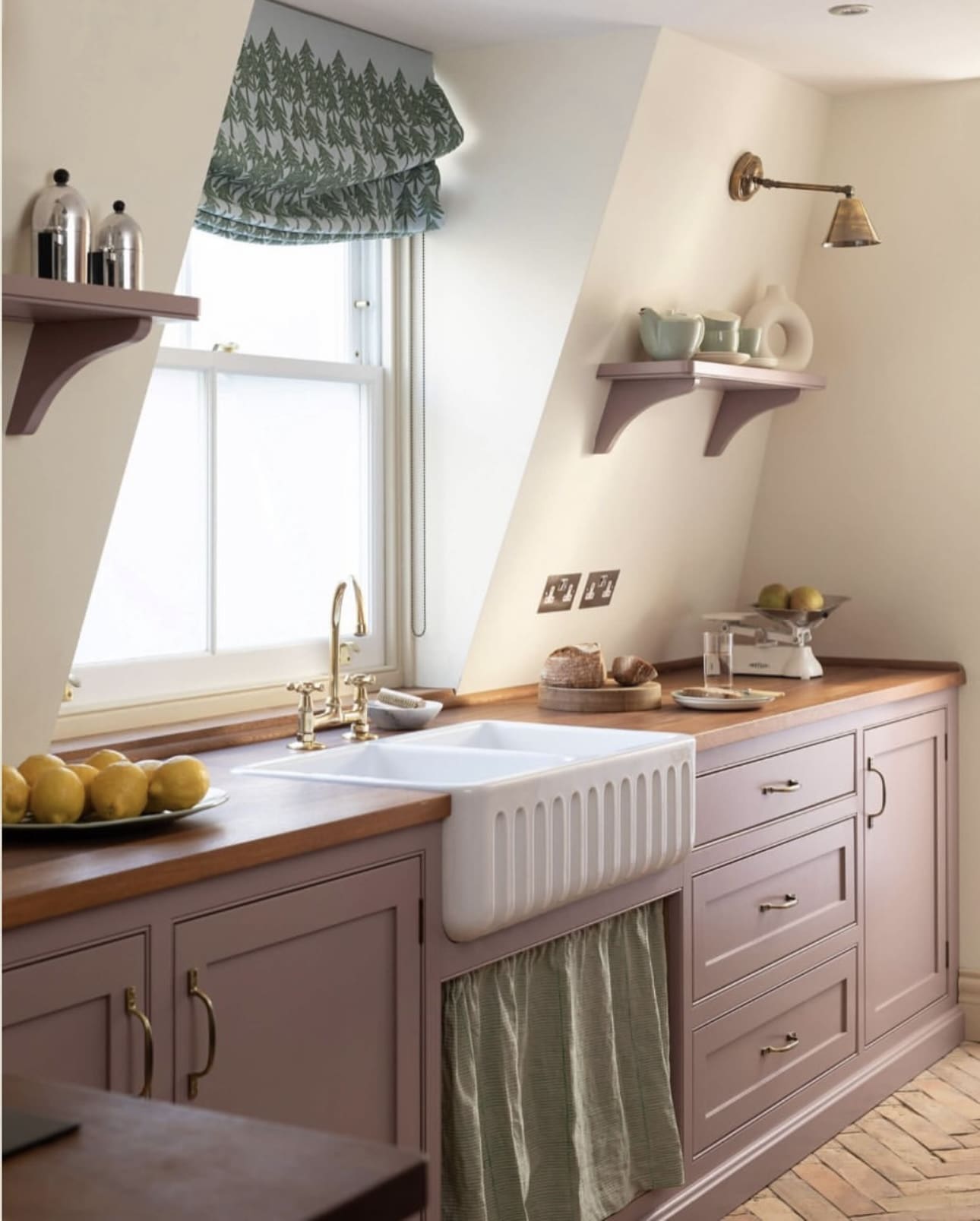 Fluted Apron Sink Brightens a Pink Cabinet Base