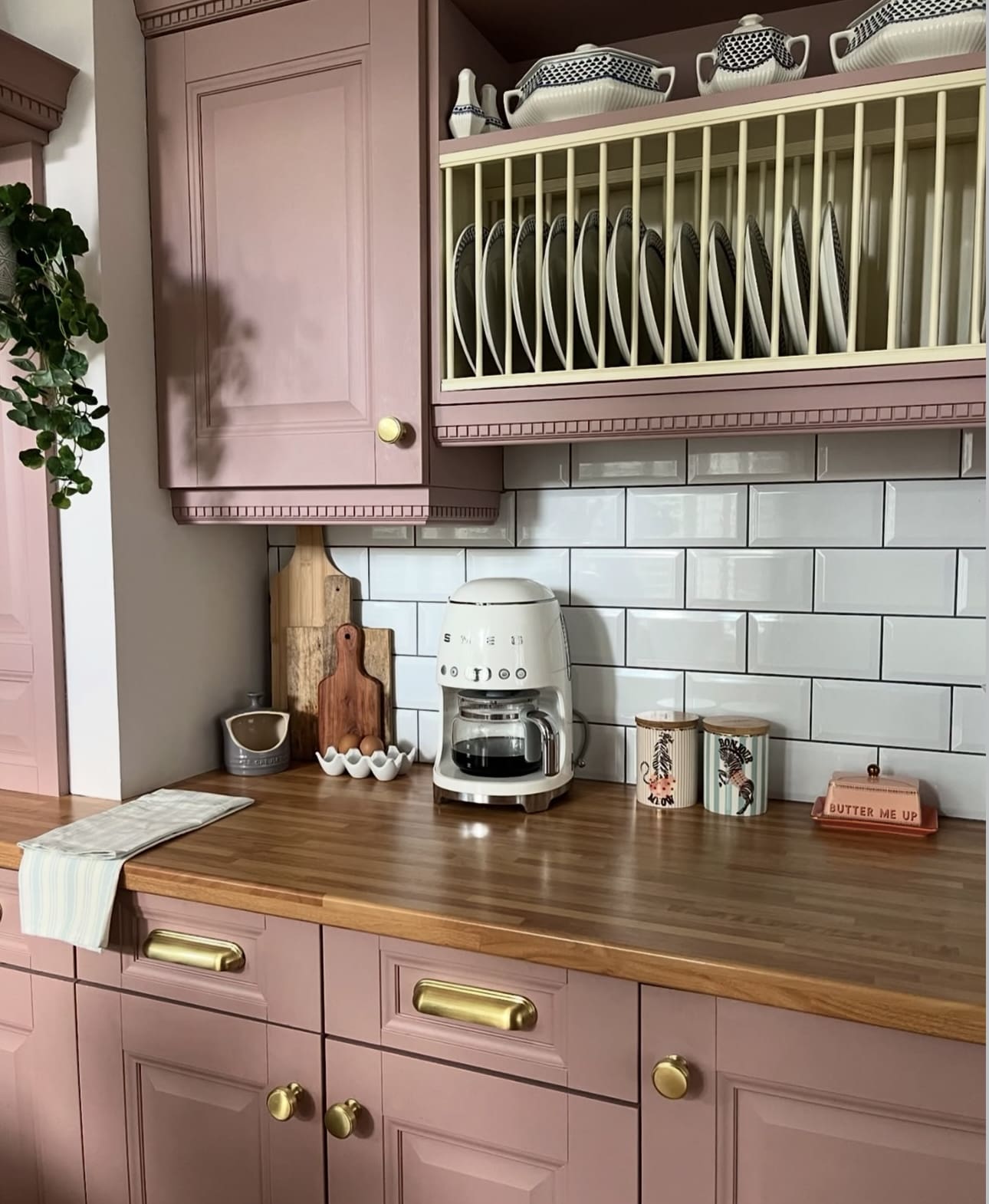 Pale Pink Plate Rack Adds Open Display Above Countertops