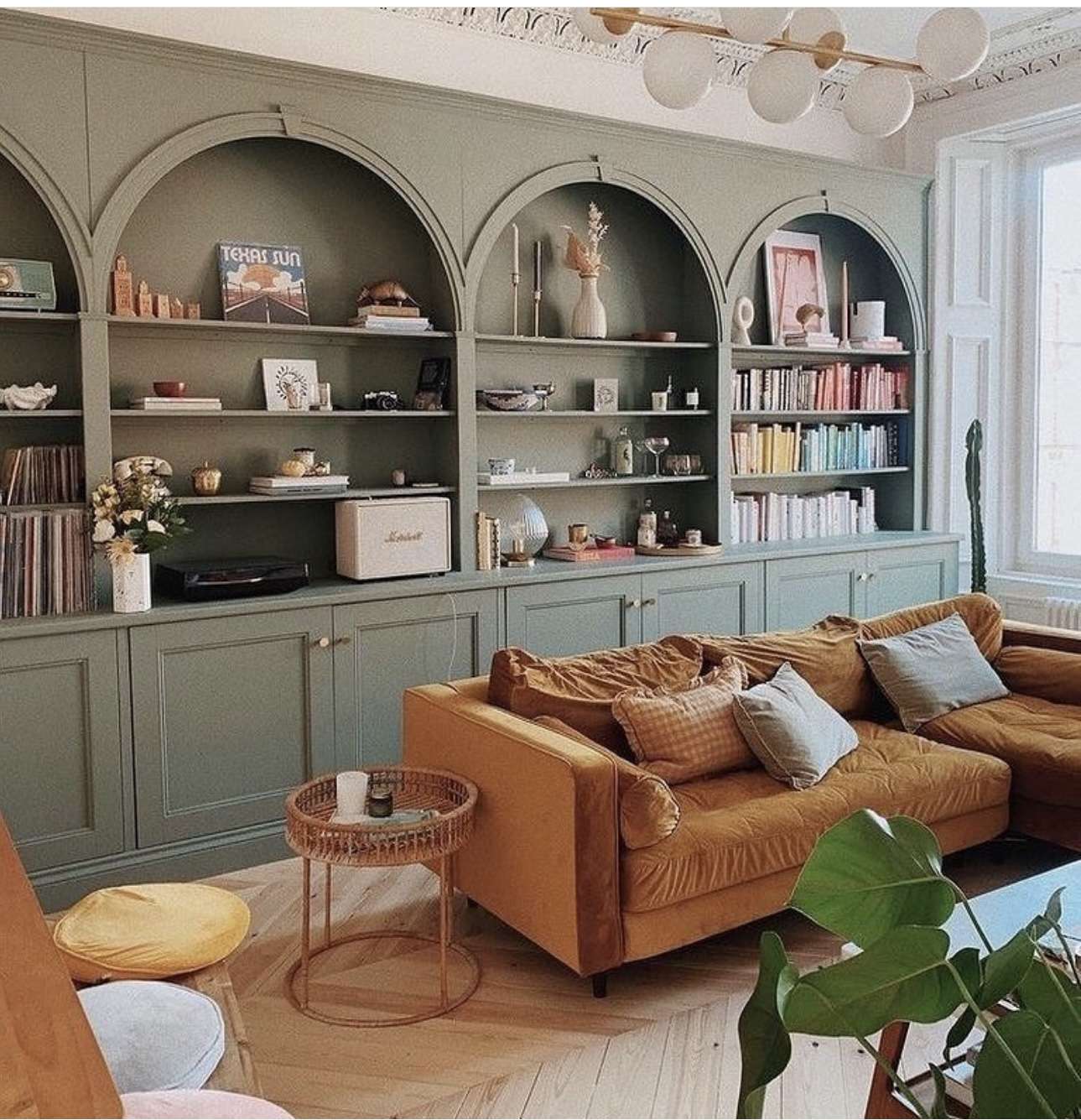 Arched Built-Ins Create Distinct Display Niches