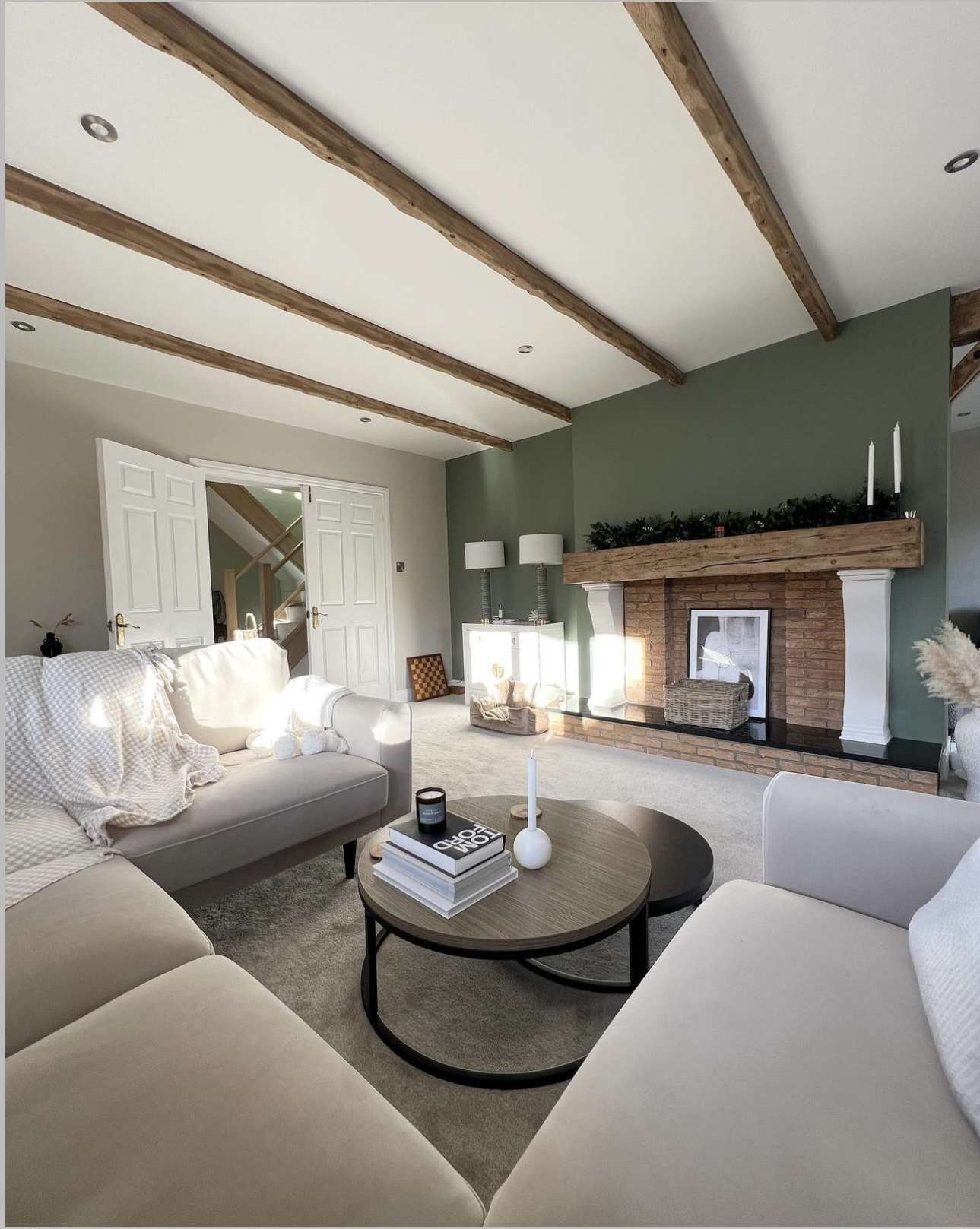 Exposed Wooden Beams Add Rustic Texture To A White Ceiling