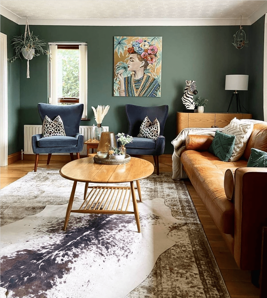 Bold Art Pops Against Sage Green Walls