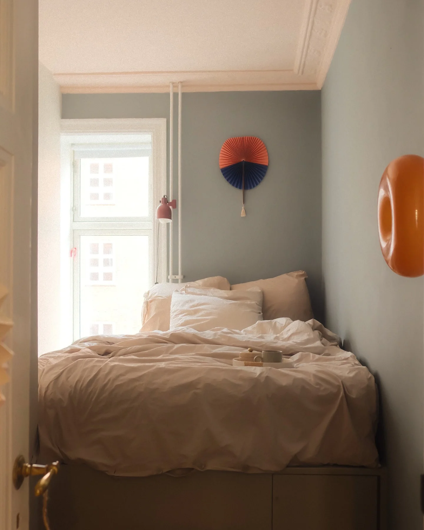 Paper Fan Wall Art Adds a Pop of Color
