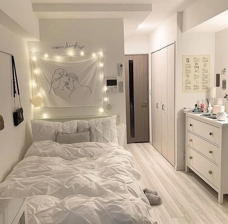 Line Art Tapestry Adds Romantic Focal Point Above Bed