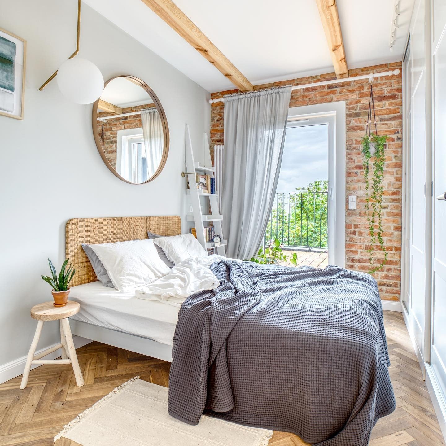 Oval Mirror Reflects Natural Light To Make Room Feel Bigger