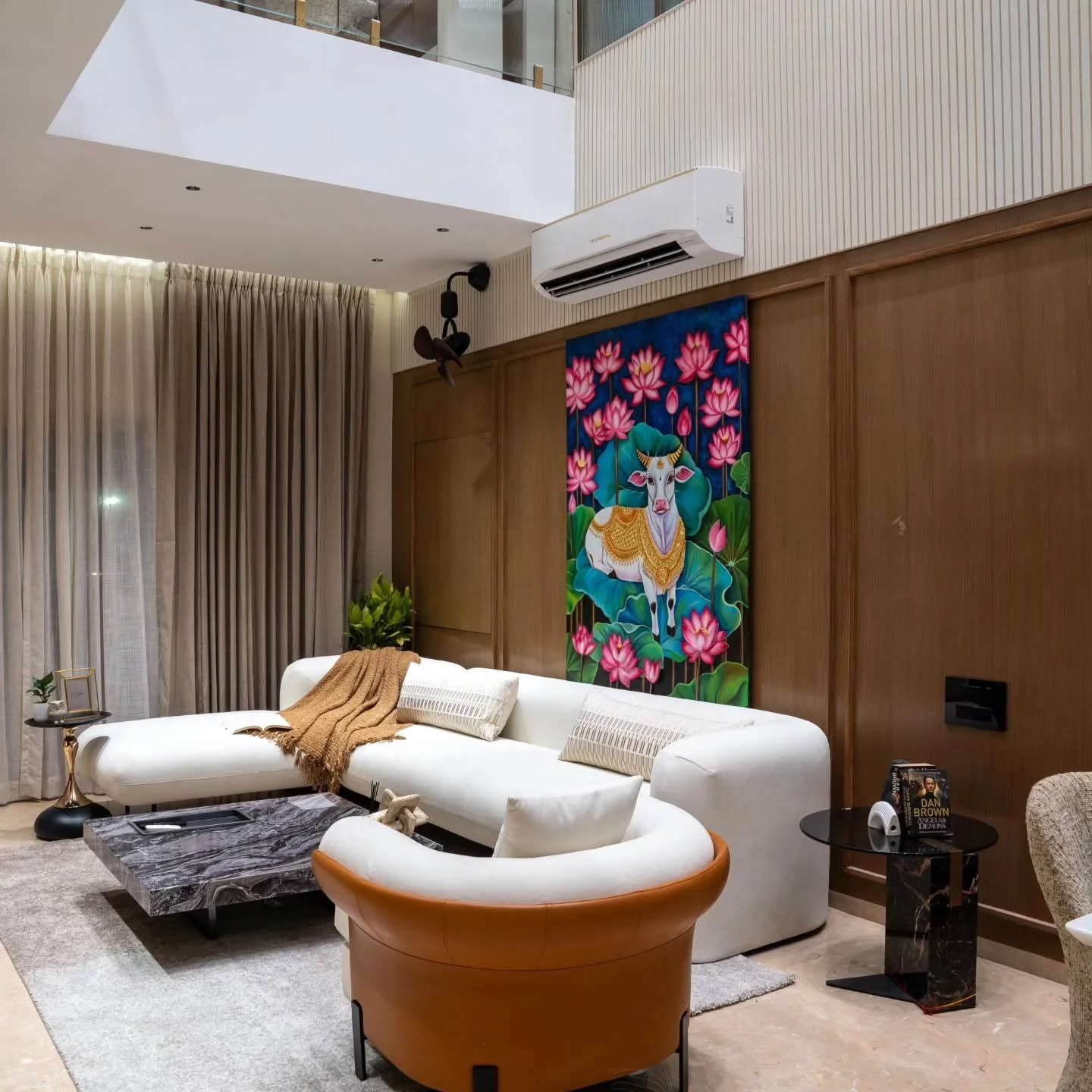 Large Artwork Adds a Bold Cultural Statement Above the Sofa