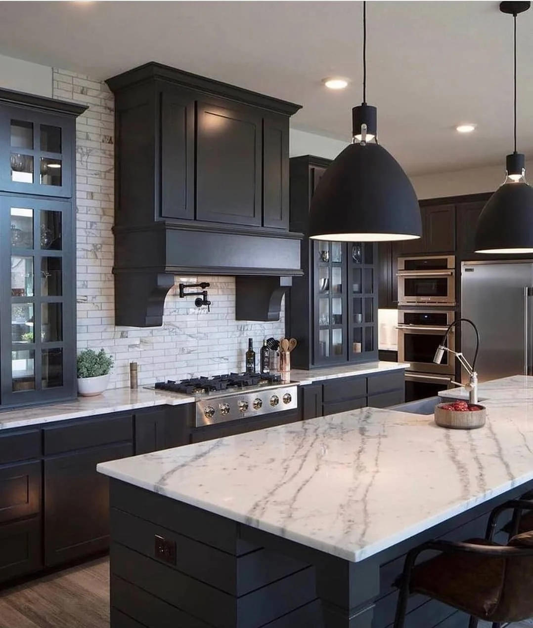 Contrast a Dark Hood Vent with White Subway Tile