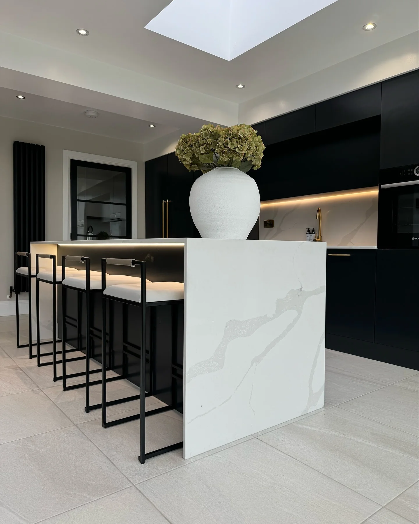 White Waterfall Island With Veined Stone Accents