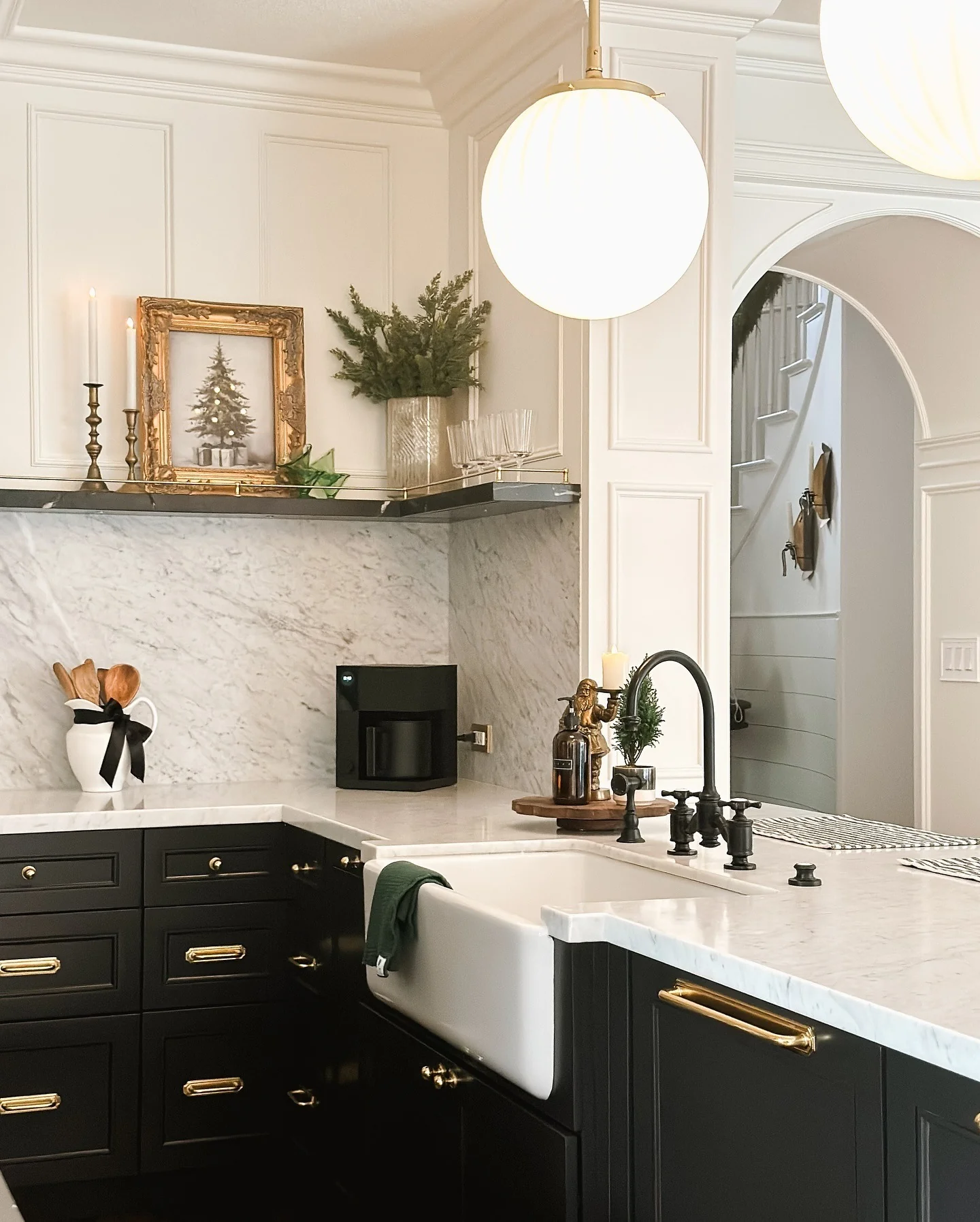 Framed Christmas Art Adds Festive Cheer to Marble Countertop