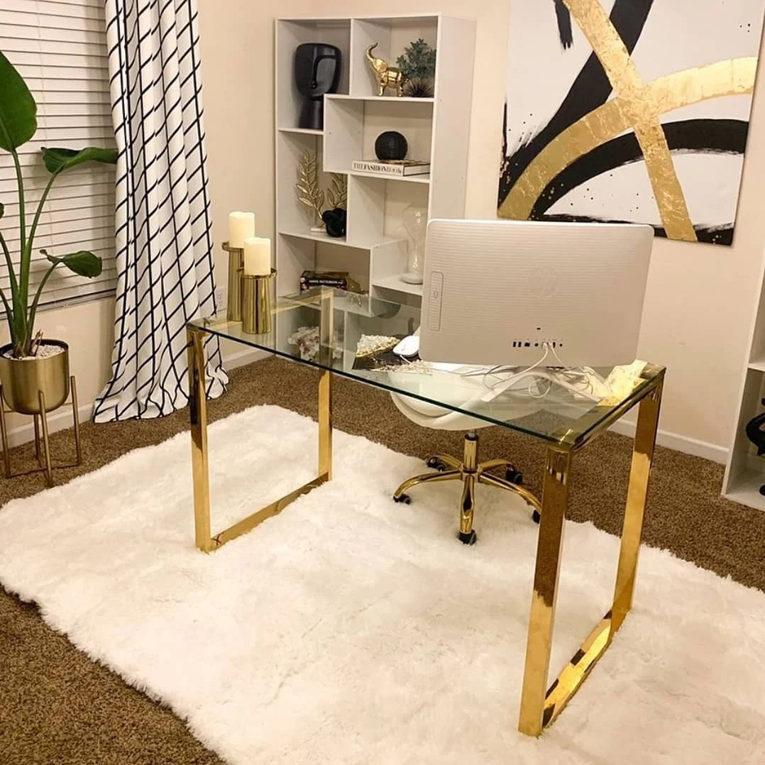 Opt for a Glass-Top Desk with Polished Gold Legs