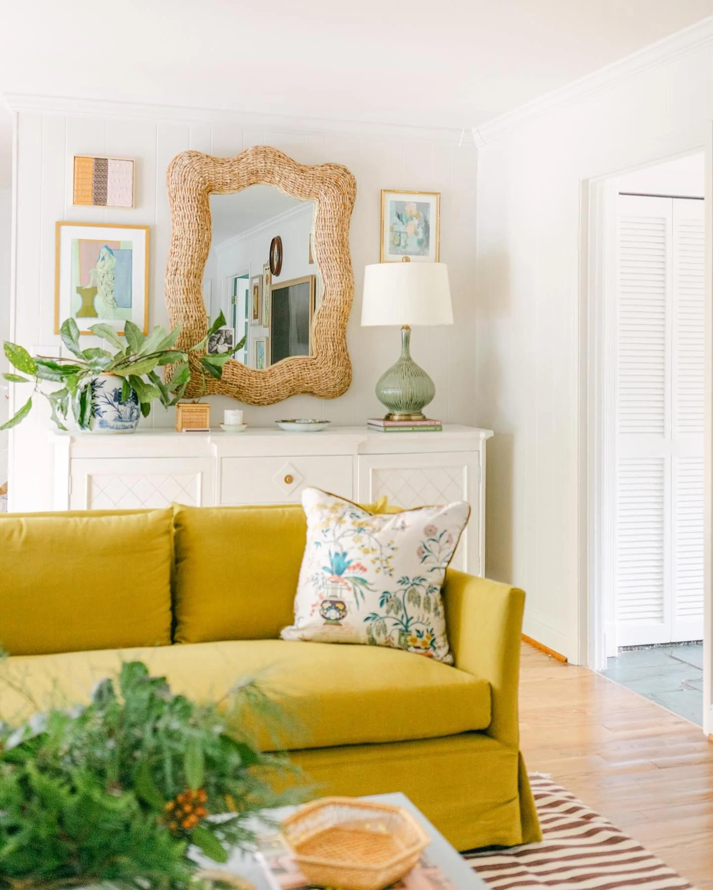 Woven Rattan Mirror Adds Organic Texture Above Console