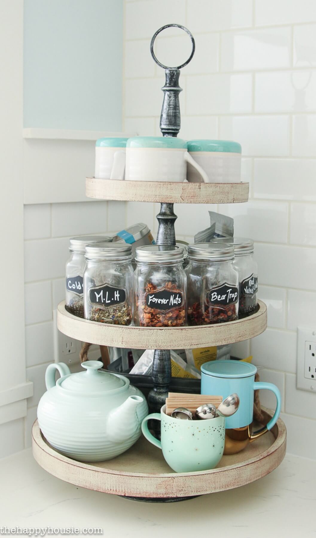 Tiered Stand Organizes Tea Station With Labeled Jars