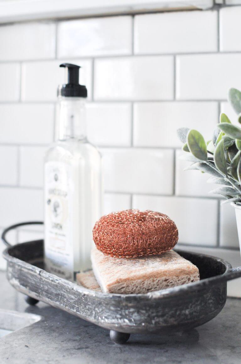 Contain Sink-Side Soaps and Sponges in a Distressed Tray