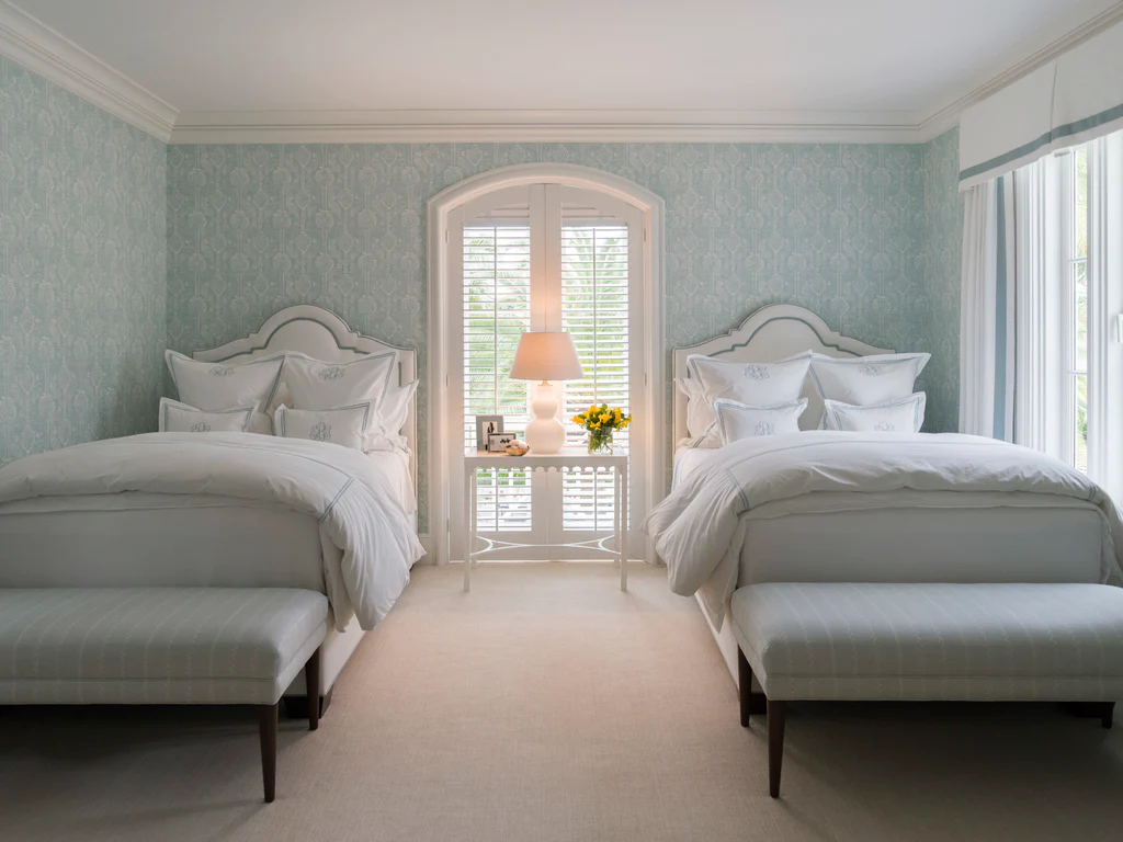 White Headboards with Blue Piping Frame Serene Bedrooms