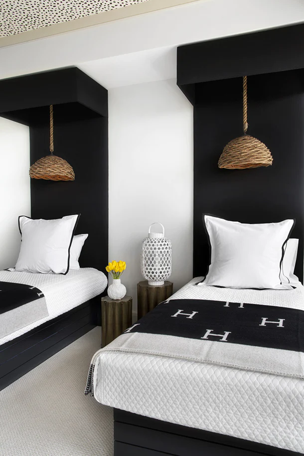 Black Headboards Define Dramatic Alcoves