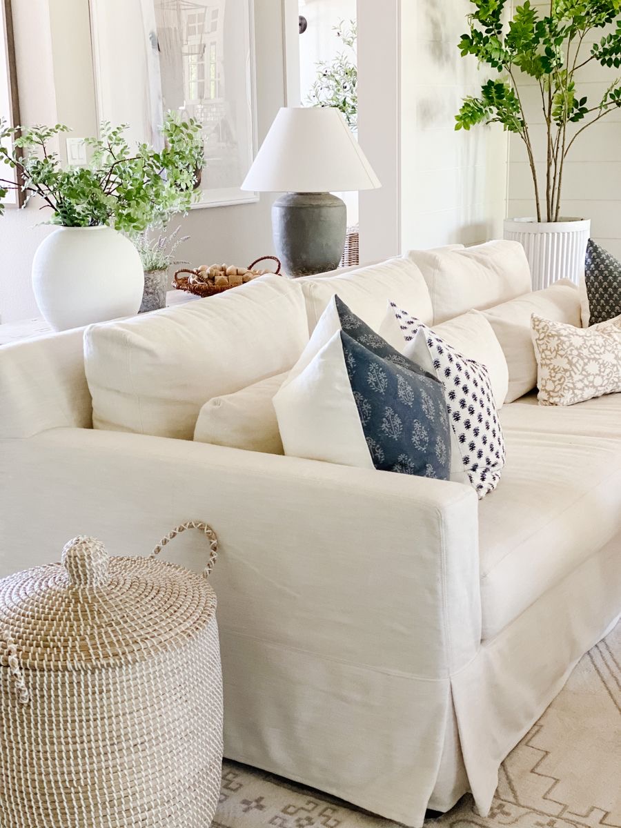 Place a Woven Storage Basket Beside the Sofa