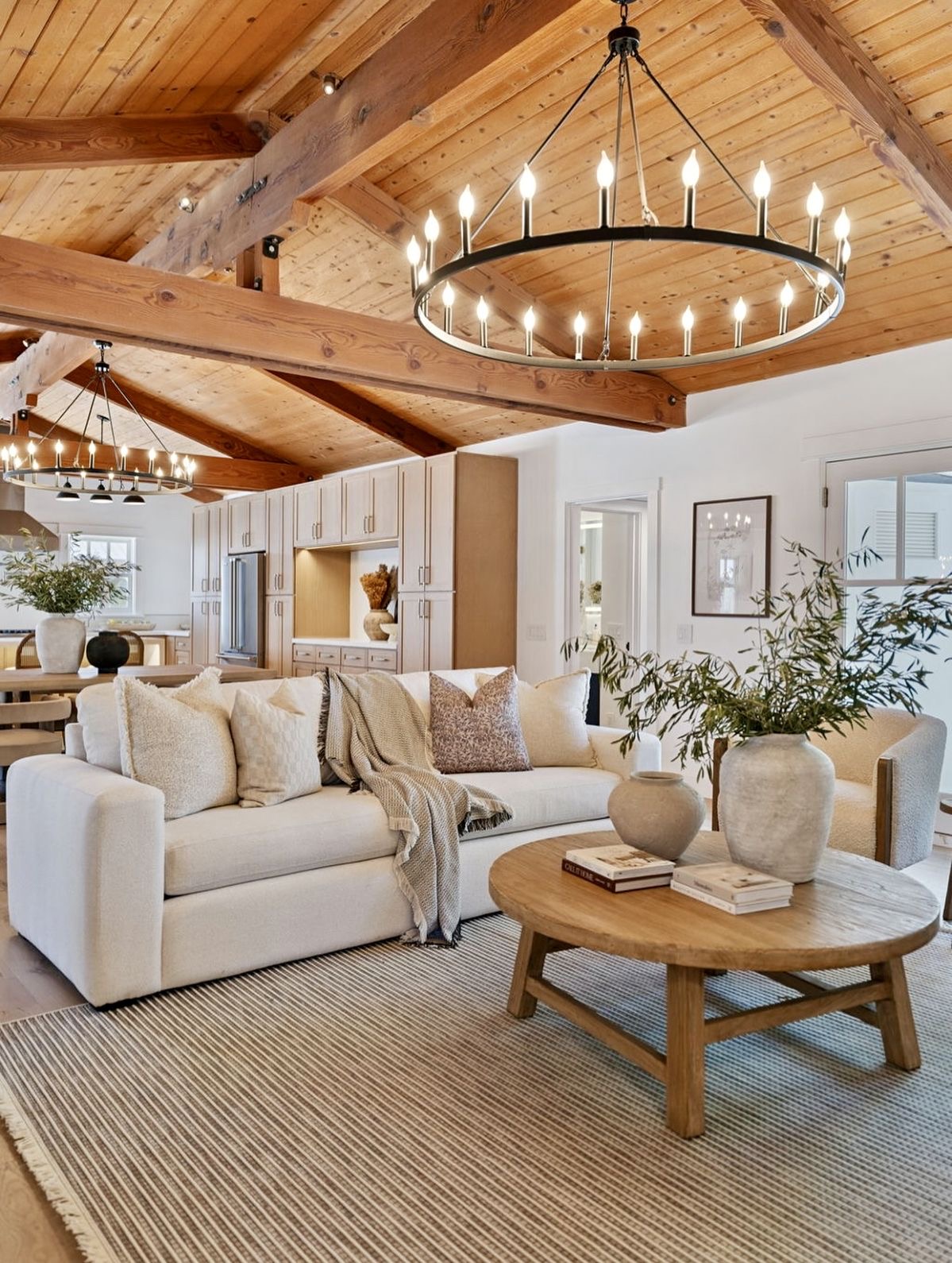 Round Wood Coffee Table Grounds a Cozy Seating Area