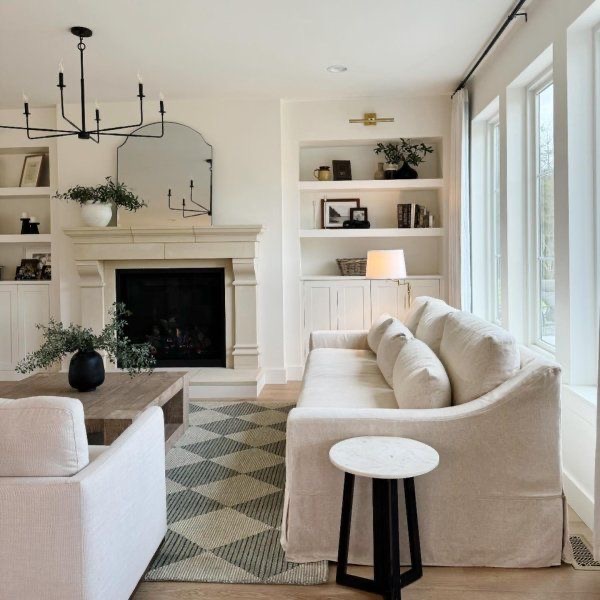 Arched Mirror Above Fireplace Reflects Light