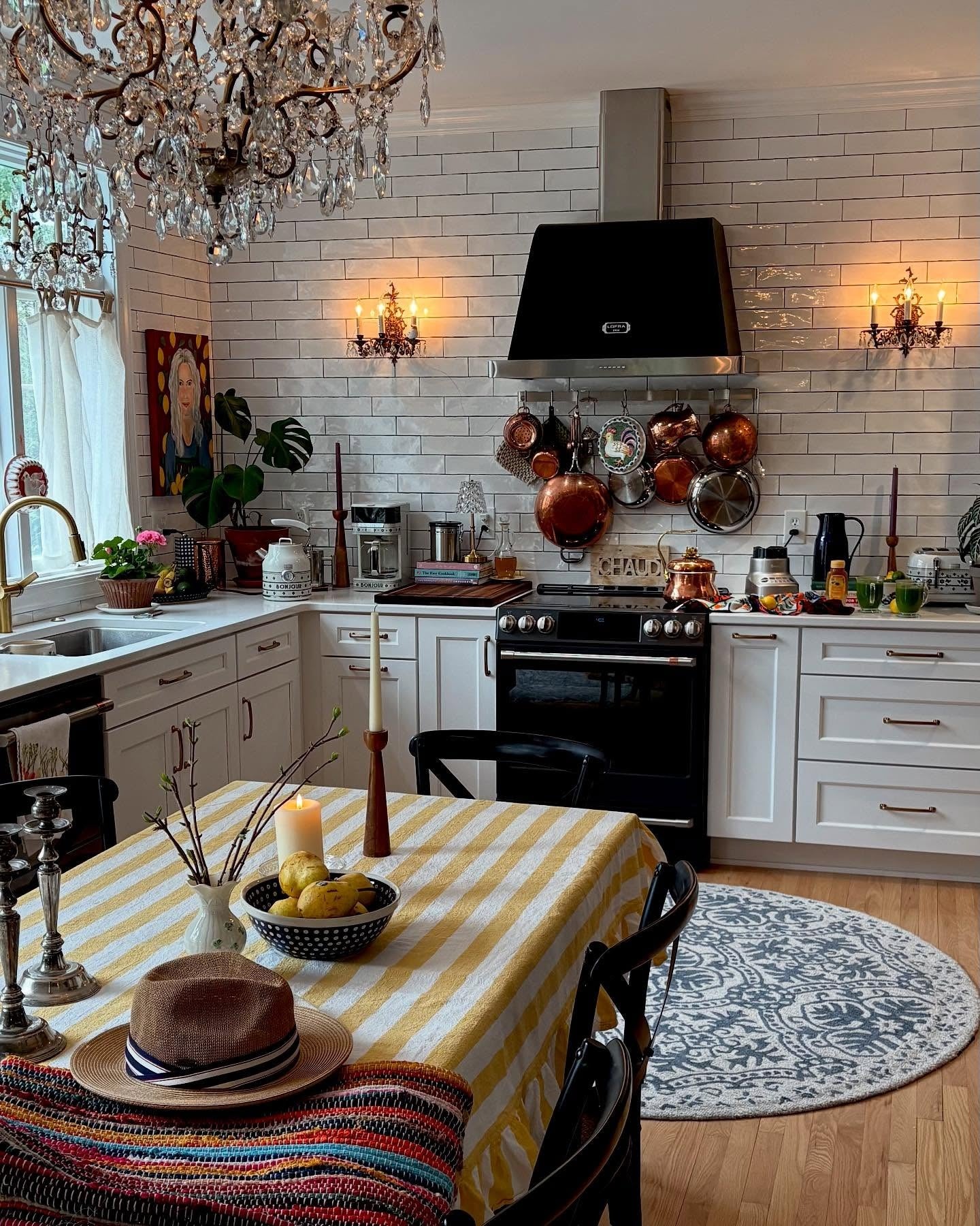 Copper Pots Add Warmth to White Tile Walls