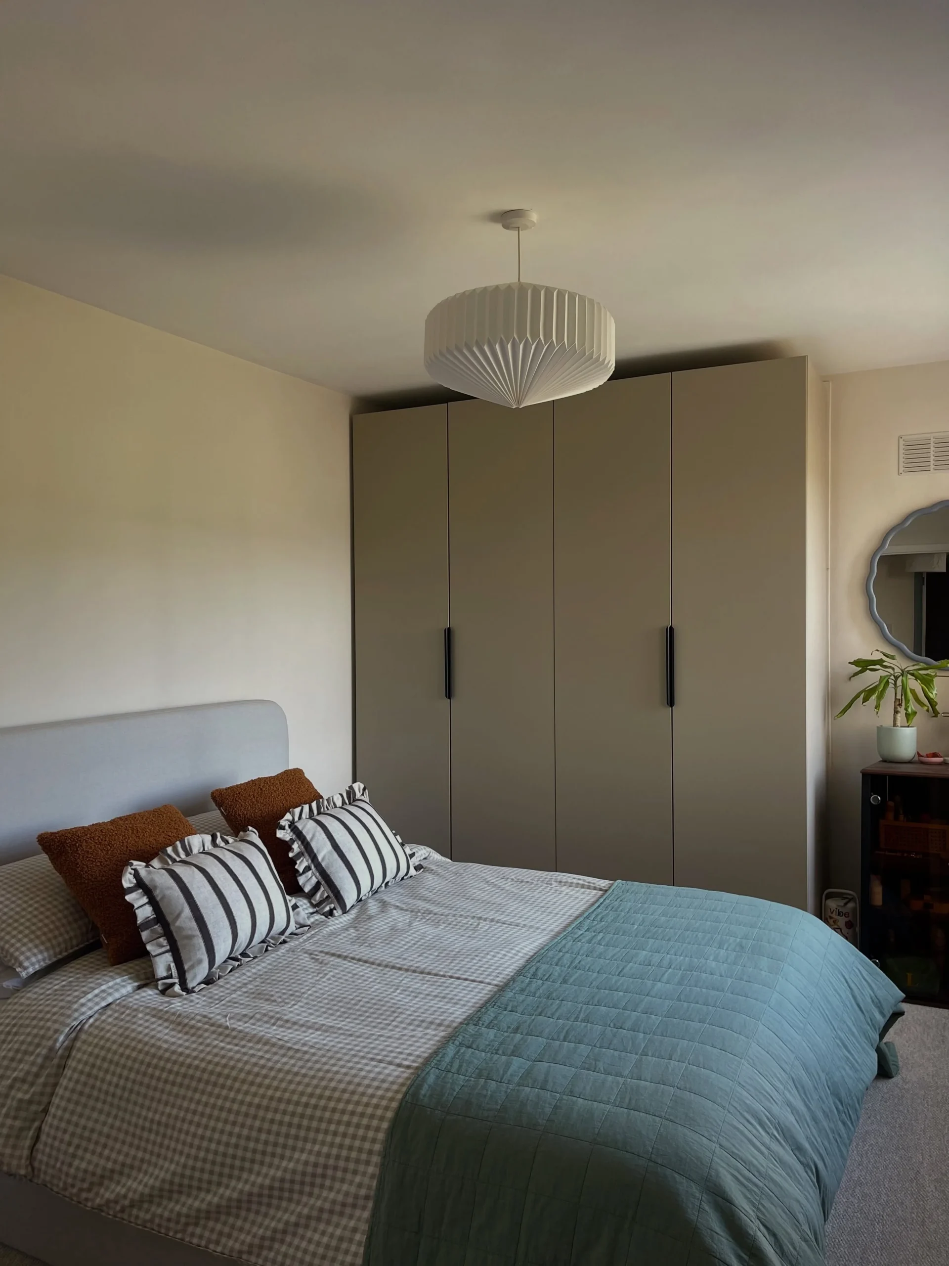 Layered Bedding Adds Cozy Texture to Grey Rooms
